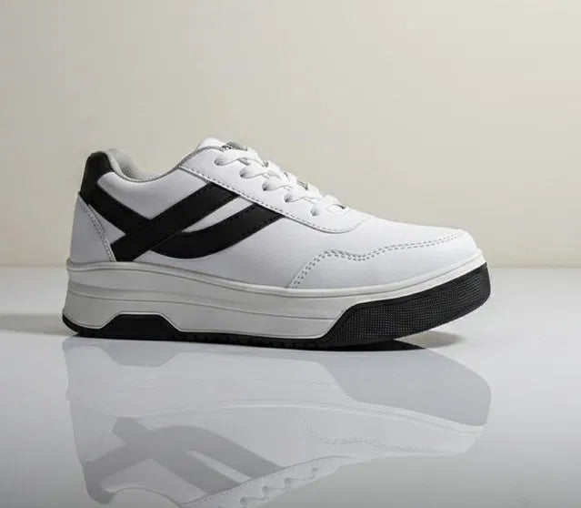 White sneaker with black stripes on a reflective surface