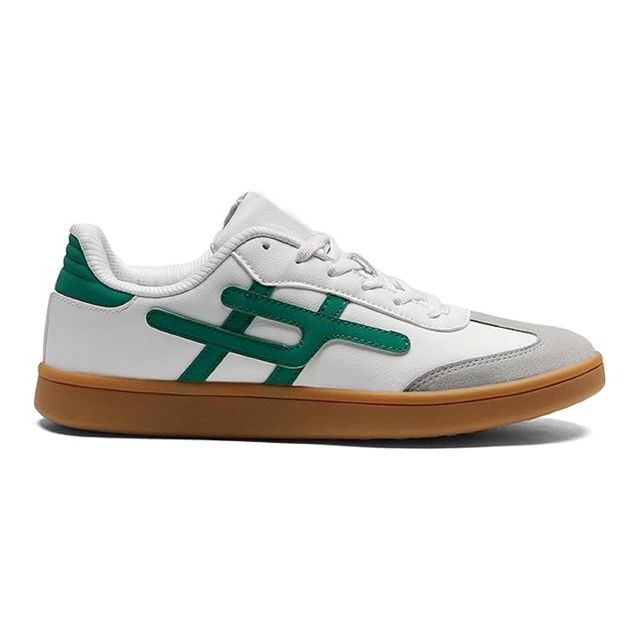 White sneaker with green accents and brown sole on a white background