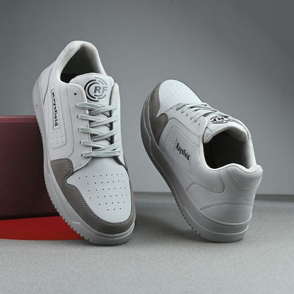 Gray sneakers with a red box on a gray background